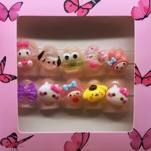 Cute Sanrio Nail Set! All sizes 30 nails 30 charms! Short duck shape nail set.
